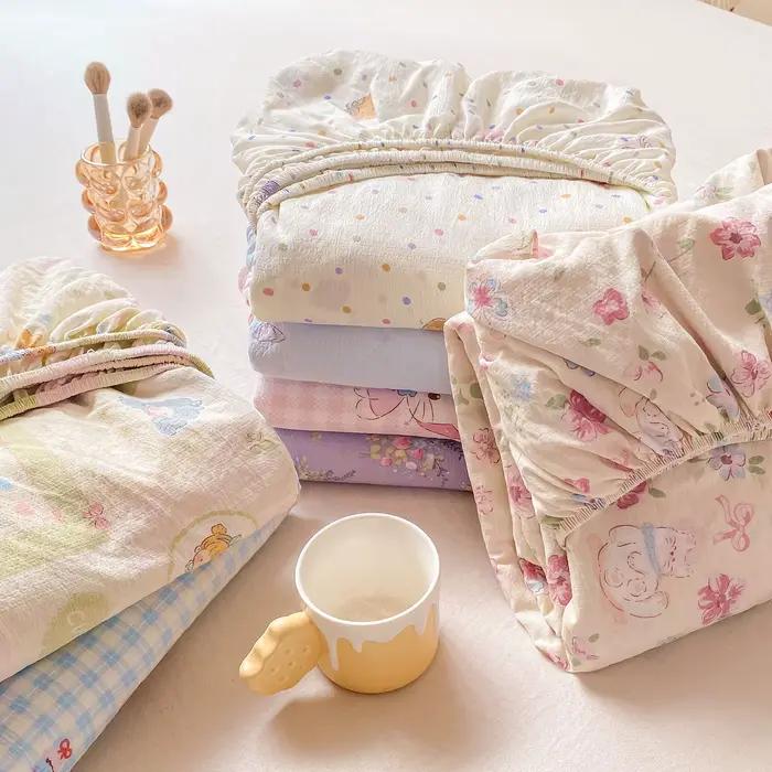Drap-housse en coton lavé avec bandes élastiques