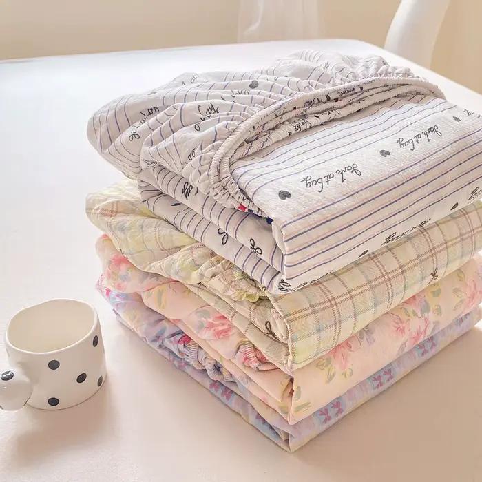 Drap-housse en coton lavé avec bandes élastiques