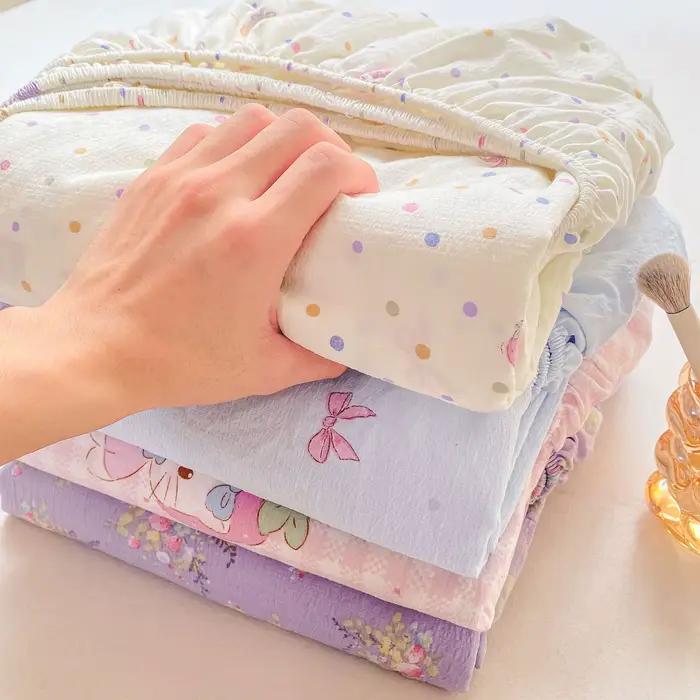 Drap-housse en coton lavé avec bandes élastiques