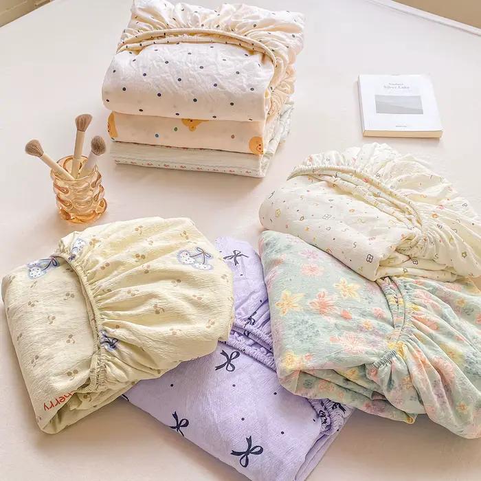 Drap-housse en coton lavé avec bandes élastiques