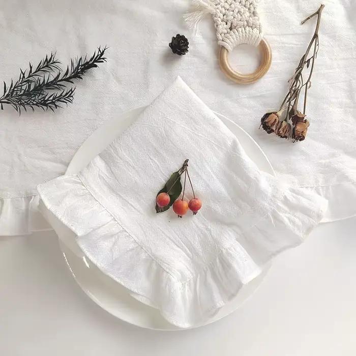 Serviettes en tissu à volants