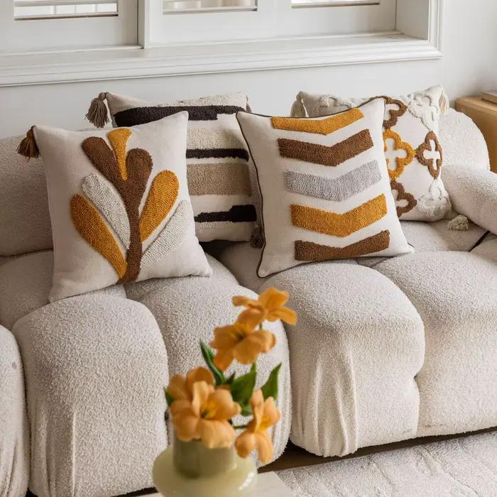 Juste de coussin nordique touffetée