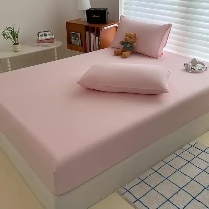 Drap-housse délavé de couleur unie avec bandes élastiques