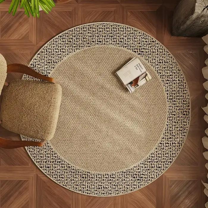 Tapis rond beige clair à texture de points subtils