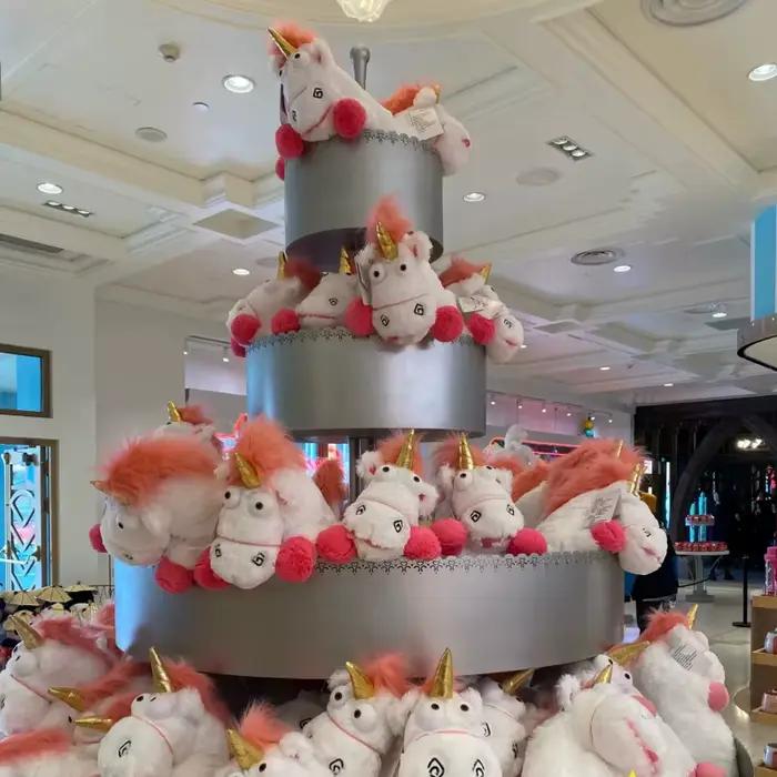 Poupée en peluche licorne originale Universal Studios, un sac à dos coussin/oreiller doux, idéal comme cadeau d'anniversaire et souvenir pour les filles