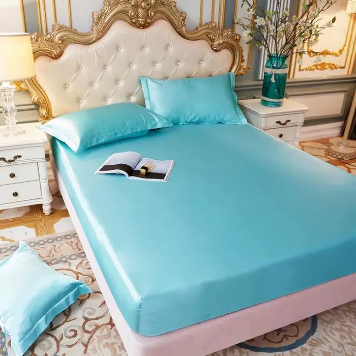 Drap-housse de couleur unie