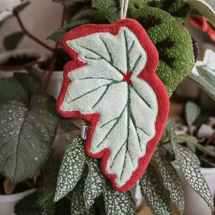 Serviettes à main à motifs de feuilles vertes