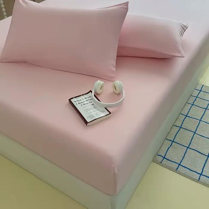 Drap-housse délavé de couleur unie avec bandes élastiques