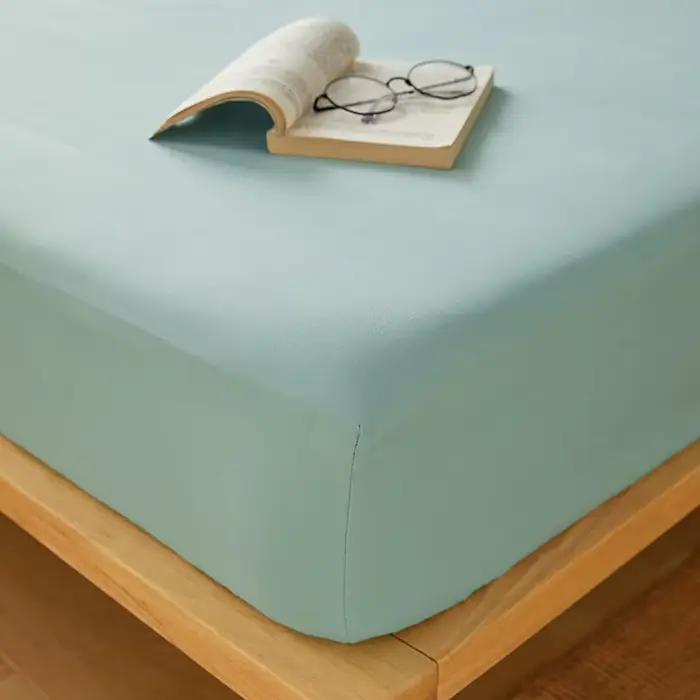 Drap-housse en coton de couleur unie avec bande élastique