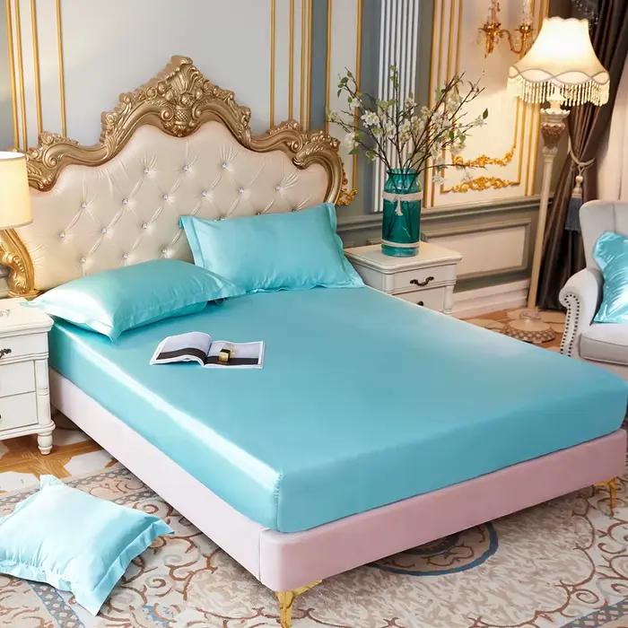 Drap-housse de couleur unie