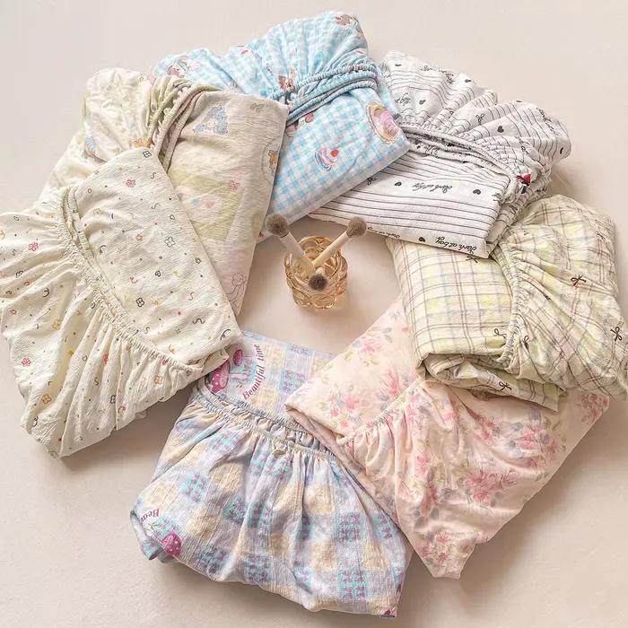 Drap-housse en coton lavé avec bandes élastiques