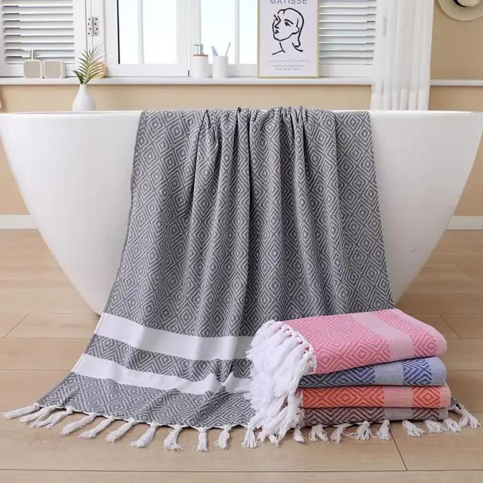 Serviette de bain douce en coton tissé
