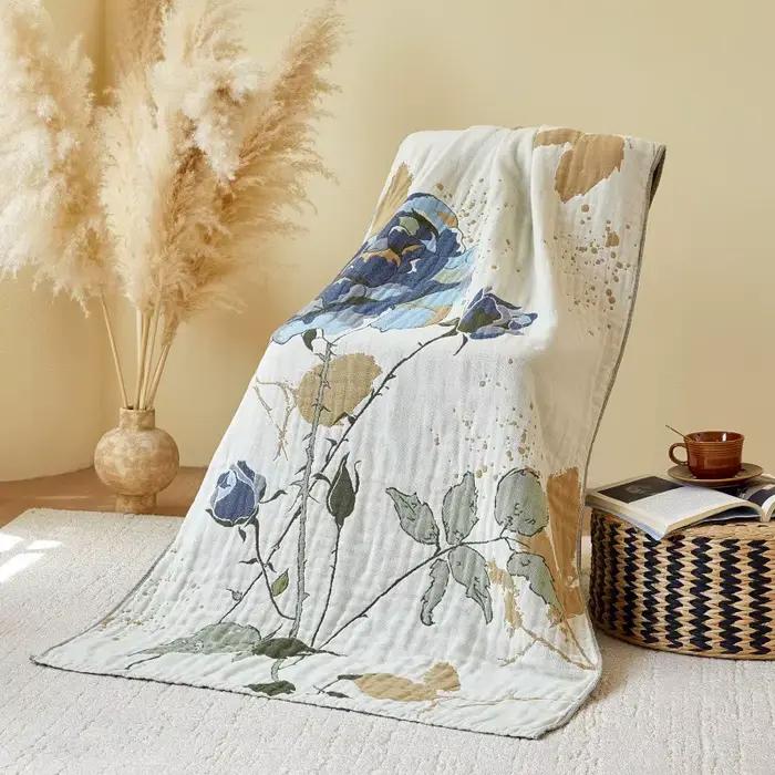 Serviette de bain en gaze florale