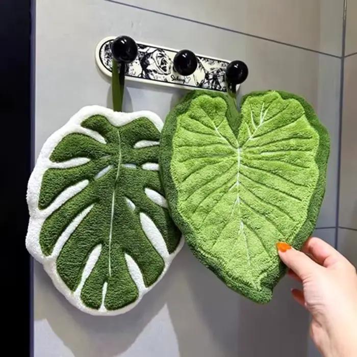 Serviette de cuisine en forme de feuilles de palmier et de bananier