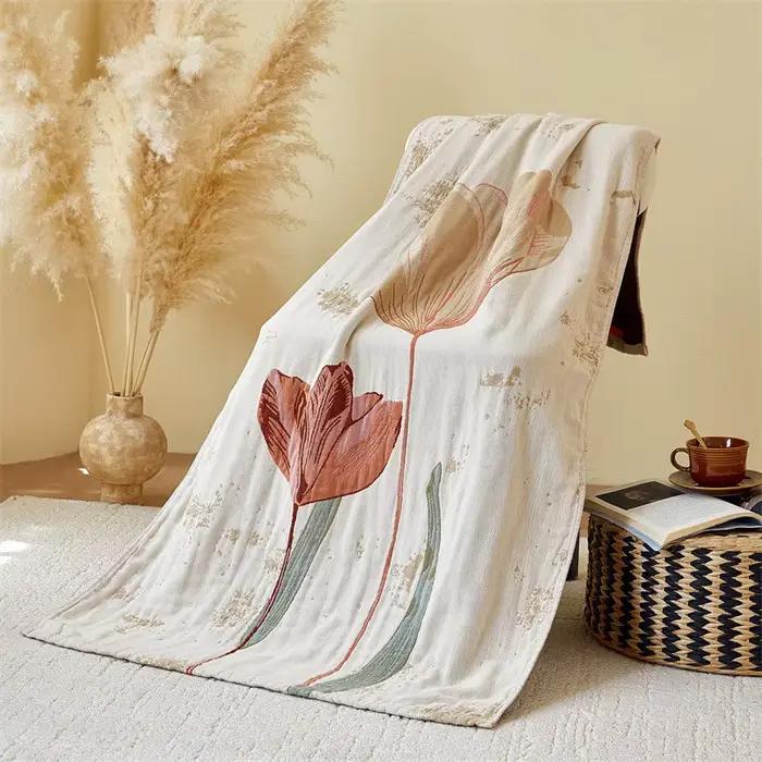 Serviette de bain en gaze florale