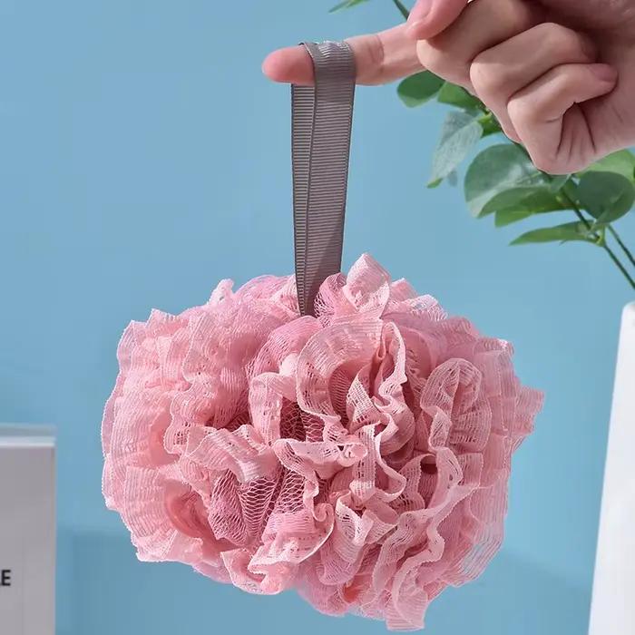 Serviette de bain en forme de boule de fleur pour homme