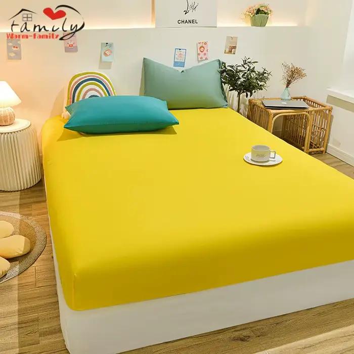 Drap-housse de protection en coton jaune