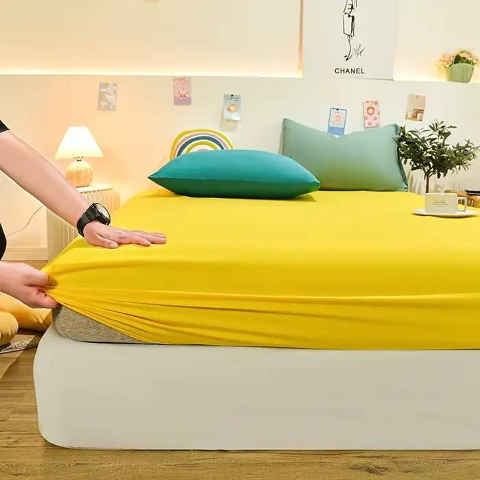 Drap-housse de protection en coton jaune