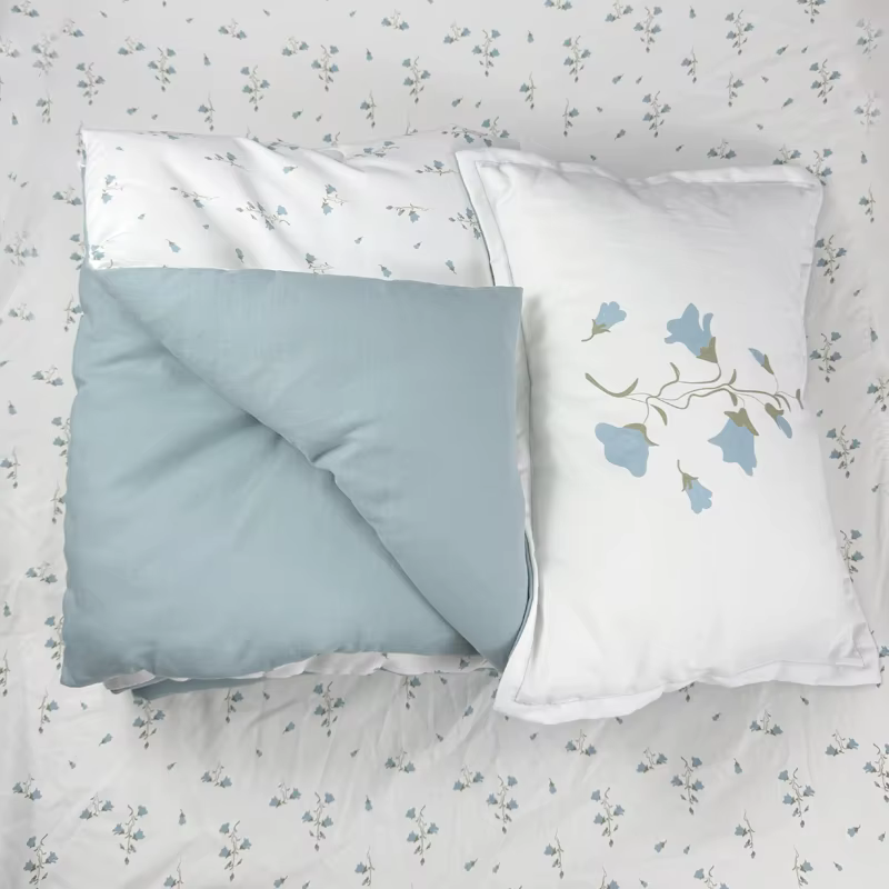 Parure de lit Ali layette SS26 Home flowers avec housse de couette imprimée, taie d'oreiller et drap