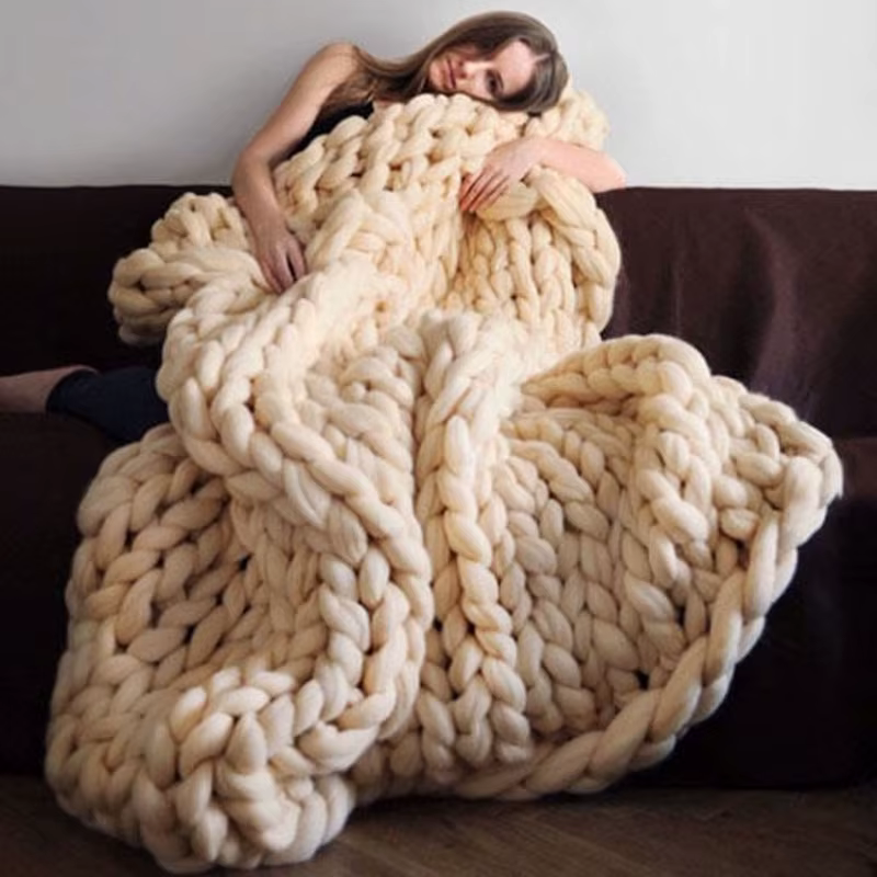 Couverture en chenille en tricot épais faite à la main